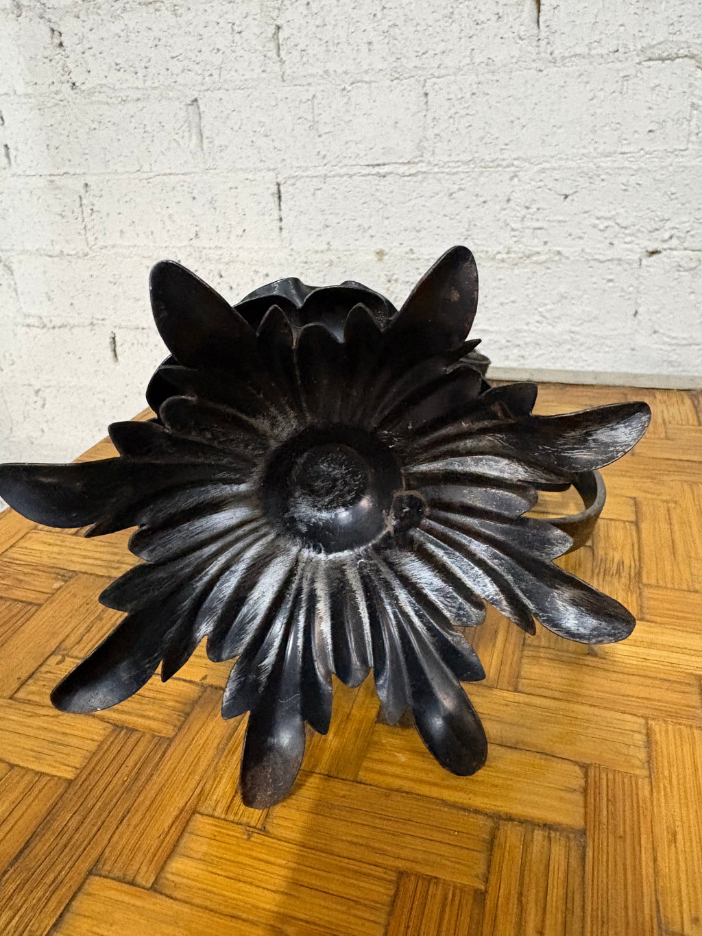 Wrought-Iron Brutalist Spring Candlestick with Floral Base and Scroll Handle, c.1920s