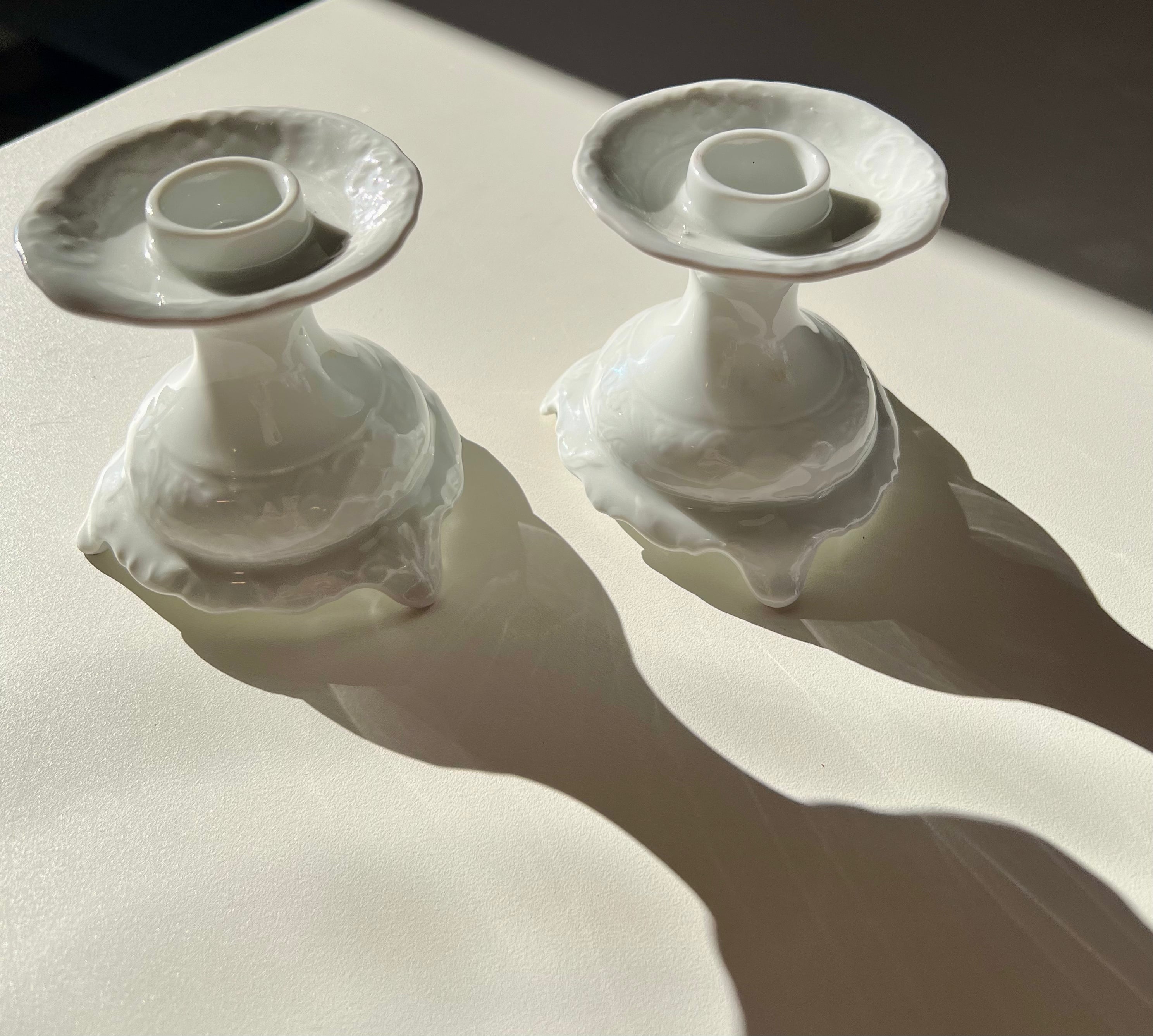 Two ceramic candlestick holders