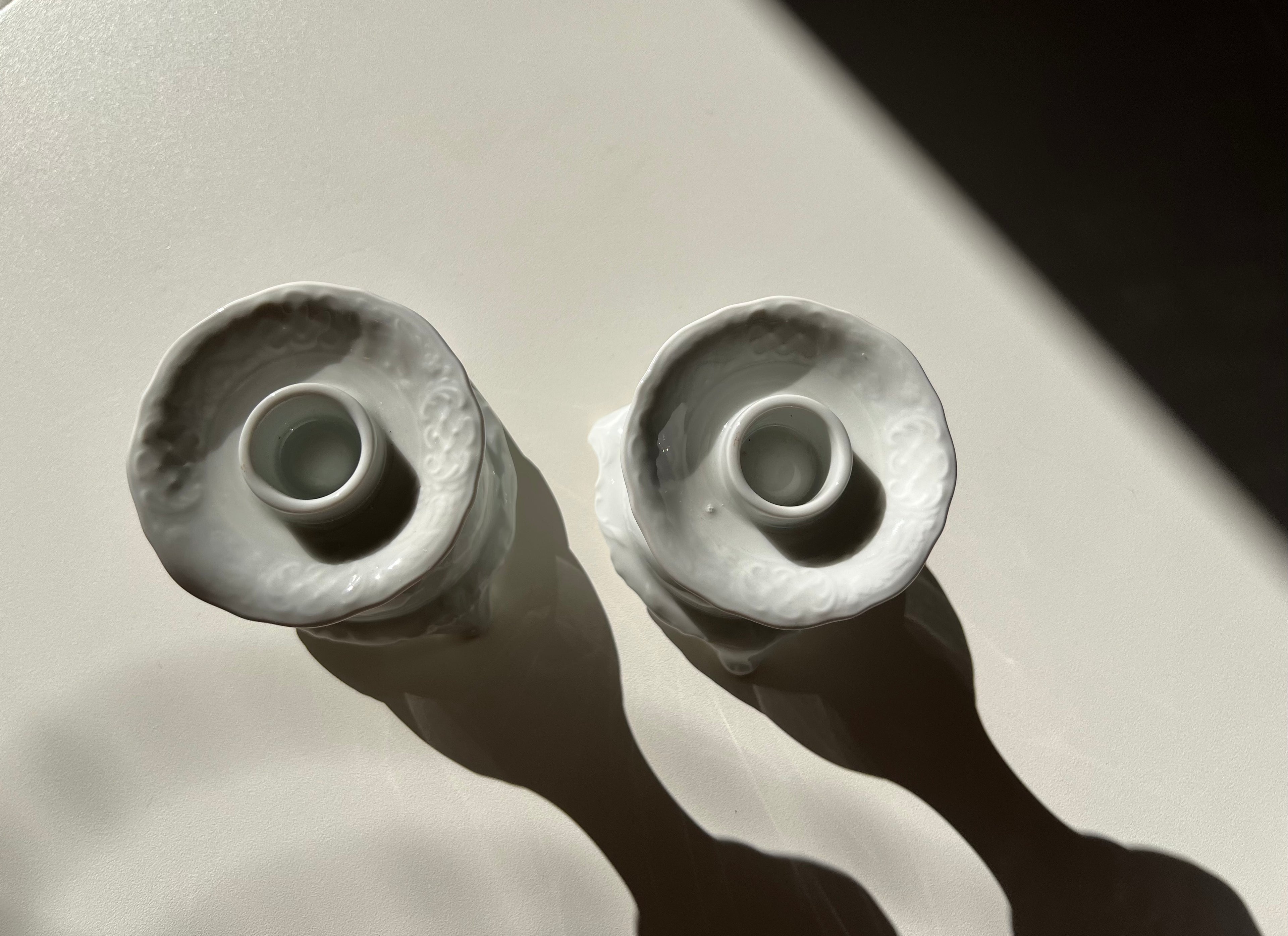 Two ceramic candlestick holders