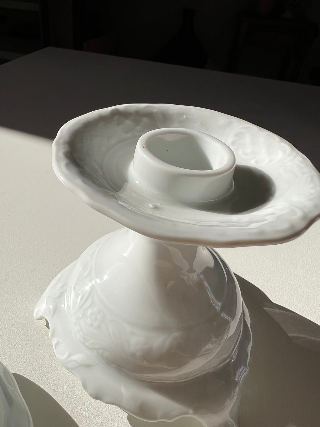 Two ceramic candlestick holders