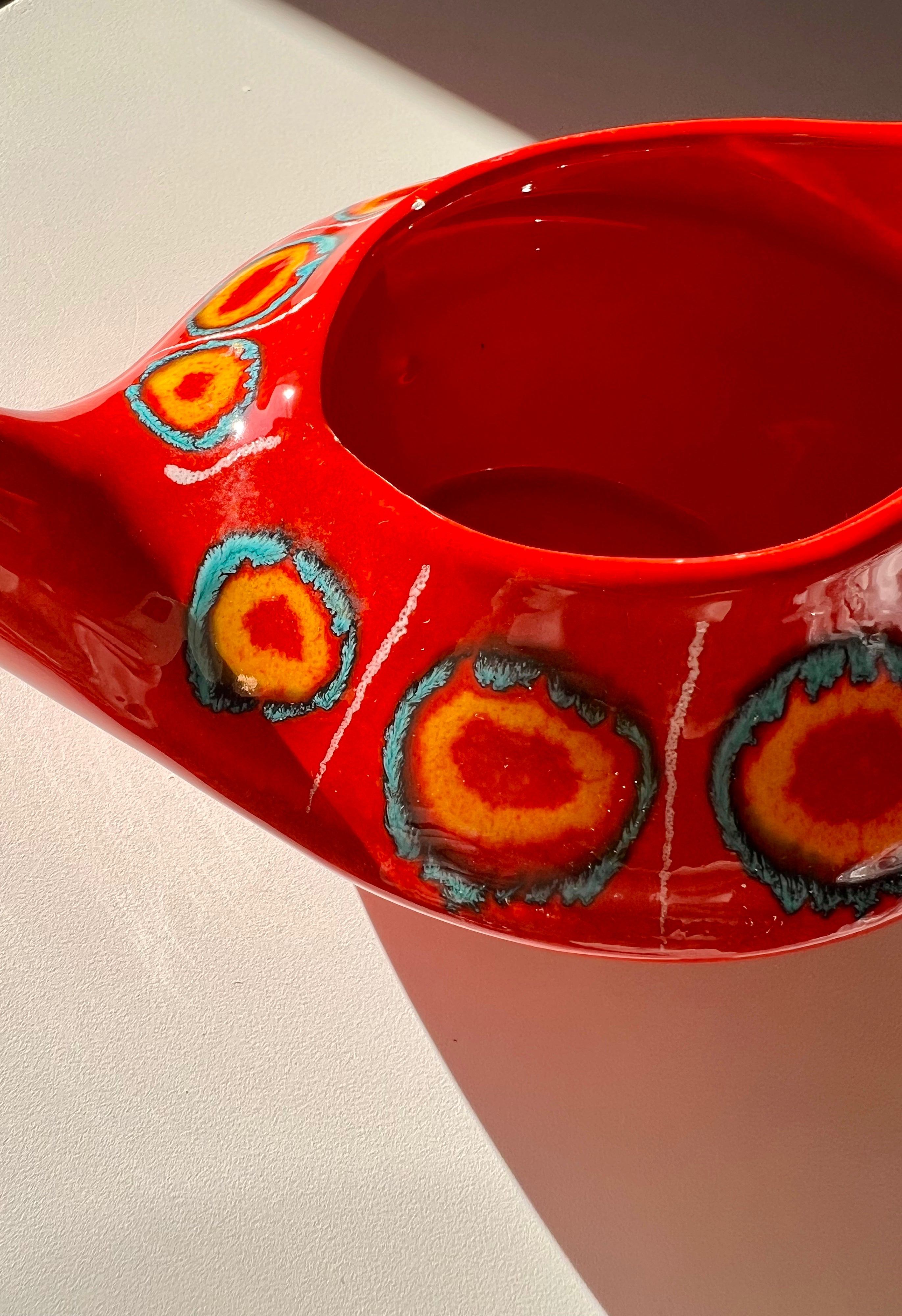 Red ceramic jug